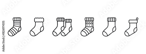 Collection of six simple line art icons depicting various styles of winter socks for festive apparel and cozy season promotions