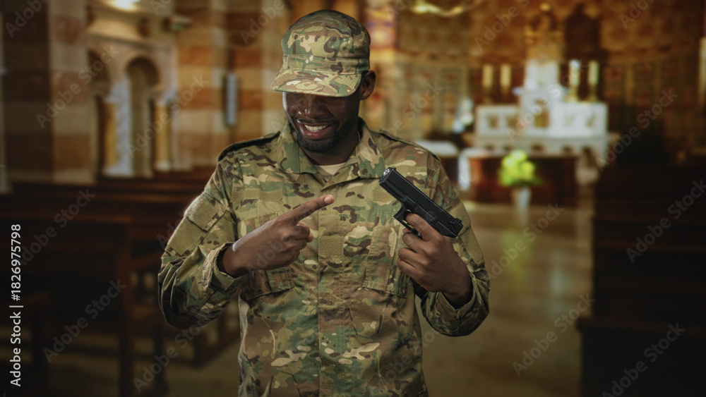 Naklejka premium Man soldier points finger at gun while smiling inside a church building, wearing camouflage uniform and cap; pride duty.
