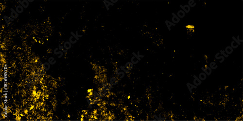 Colorful dust explode Paint of Holi, dust particles splash. Dark yellow slate background toned classic color. Distressed rough grunge texture surface yellow color. grainy grunge background texture.