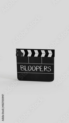 Bloopers word on Film Slate Clap Board Outtakes Mistakes Wrong Flubs Movie 3D Vertical Animation	