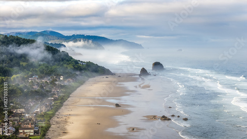Aerial shot of foggy Cannon Beach at sunrise