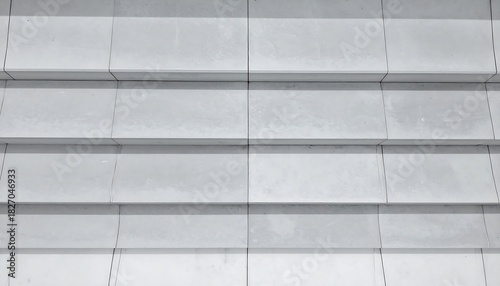 Abstract aerial view of layered steps and an adjacent ramp in clean modern style