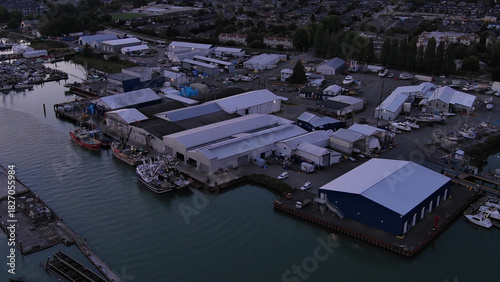 Aerial view of marina and buildings below