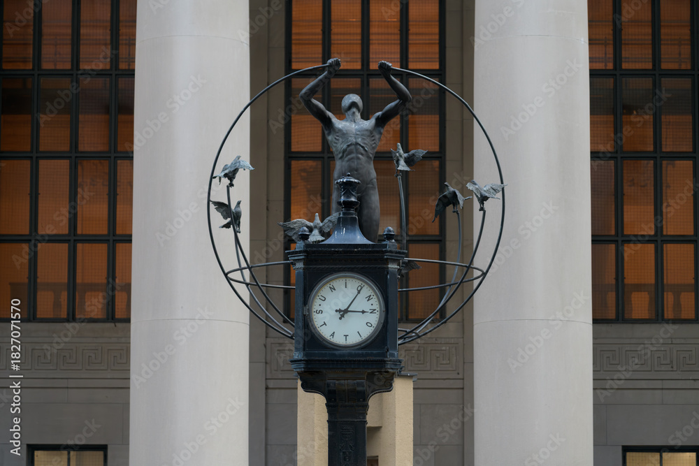 Fototapeta premium Union Station clock and Francesco Perilli’s Monument to Multiculturalism outside the main entrance, Toronto