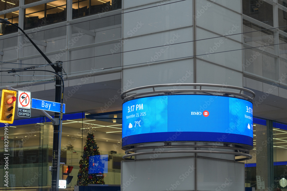 Fototapeta premium digital ring sign with time and date at First Canadian Place, BMO Bank of Montreal, King and Bay, Toronto