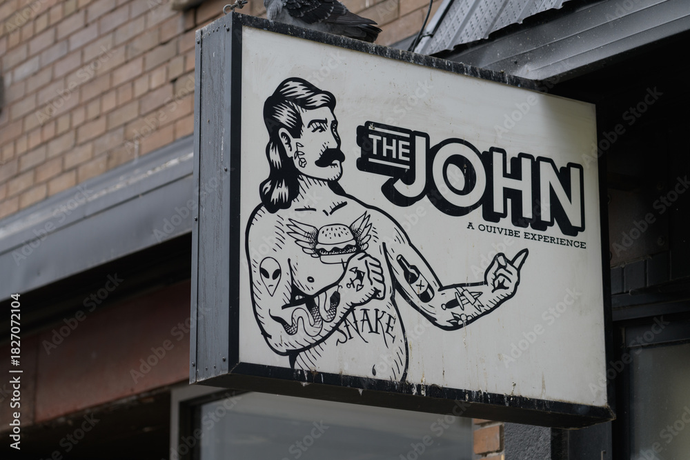 Fototapeta premium vintage ghost sign of The John: On Bloor - Craft Beer and Bistro once located at 1174 Bloor St W, Toronto