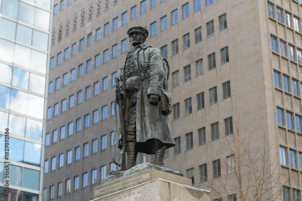 Fototapeta premium principal sculptural figure of Sons of England War Memorial by Charles Adamson located at University Av and Elm St, Toronto