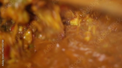Cooking south Indian vegetable curry 'Sambhar'.