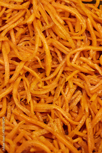 Close-Up of Spicy Korean Carrot Salad – Fresh Shredded Carrots with Seasoning