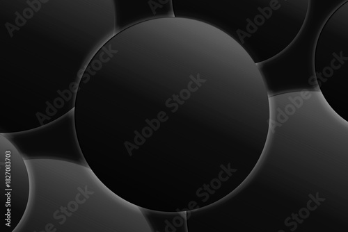 Abstract black circles with glossy surfaces forming a seamless, modern dark background