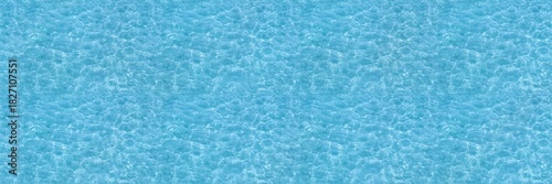 Water ripple seamless background texture - top view of clean, clear, blue water ripples. Image can be tiled to create a larger image or higher resolution background. Water has the chemical formula H2O