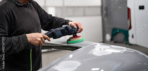 Industrial workshop with the metal frame construction of a bus or RV. Large vehicle chassis in fabrication, showcasing manufacturing, engineering, and assembly environment.