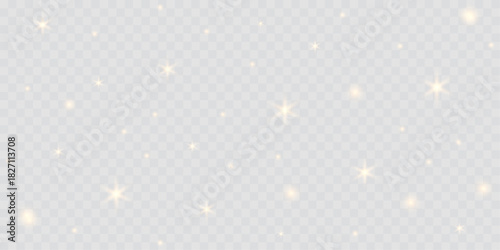 Golden sparkling dust with soft bokeh lights and shimmering confetti on a transparent background. A warm yellow glow creates a magical, festive atmosphere—ideal for Christmas, New Year, holiday design