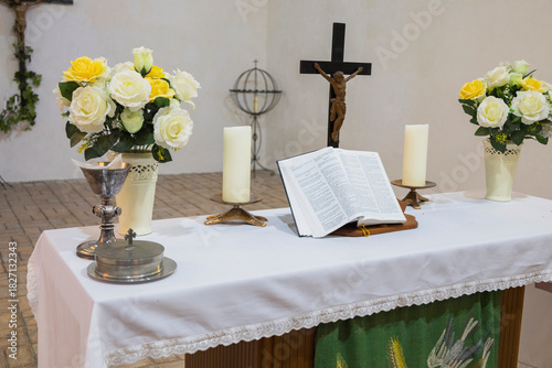 Sacred morning ceremony, Church setup with symbols of faith, Preparation of sacred space for morning worship, Serene chapel arrangement with candles and religious icons
