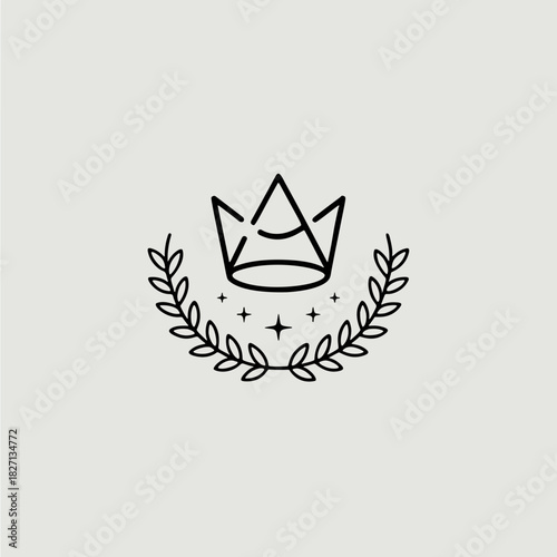 Elegant minimalist crown emblem conveying luxury surrounded by a delicate laurel wreath with soft