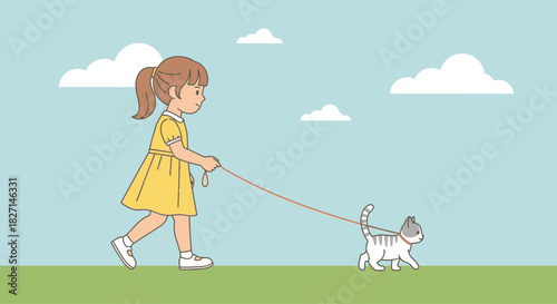 A young girl in a yellow dress walking her pet cat on a leash outdoors.