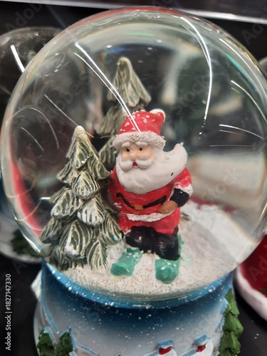 glass snow globe with Santa 