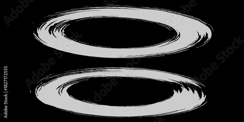 Two bold black ink circles painted with dynamic brush strokes, minimalist Japanese sumi-e style, clean background.