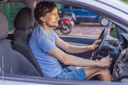 Man parking his car in an urban setting, carefully maneuvering in a tight space. Concept of driving, vehicle control, daily commute, safe parking, and modern lifestyle