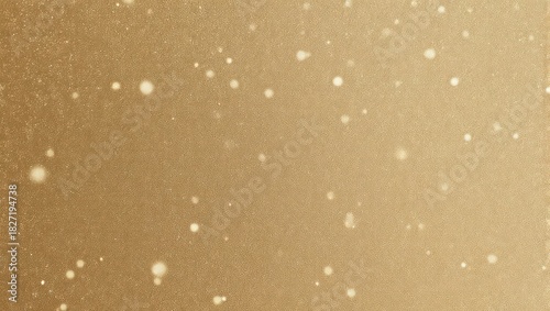 Warm gold gradient background speckled with bright, out-of-focus, glowing white particles
