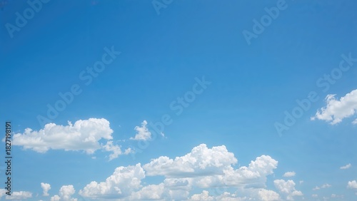 Fototapeta Naklejka Na Ścianę i Meble -  Clear sky with scattered clouds during daytime.