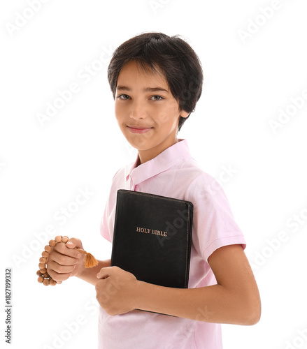 Little boy with Bible and r...