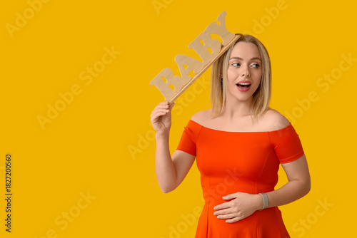 Pretty pregnant woman with ...