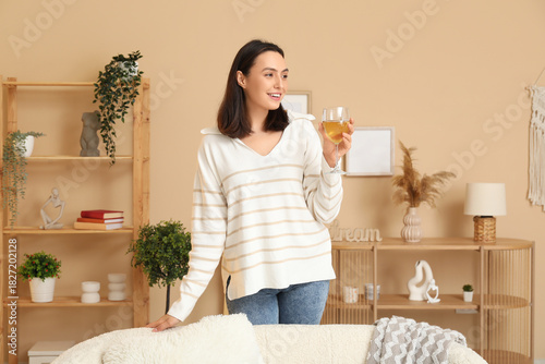 Beautiful woman with glass ...