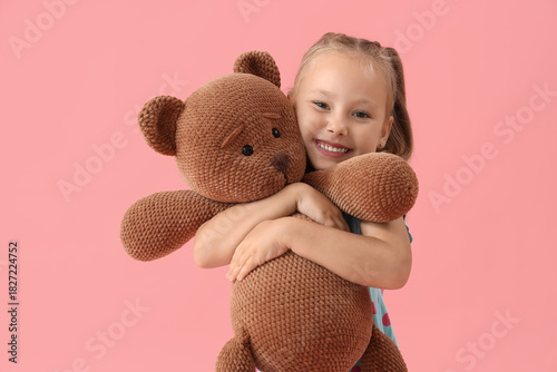 Cute little girl with teddy...