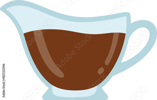 A clear glass gravy boat filled with rich brown gravy, ready to be served.