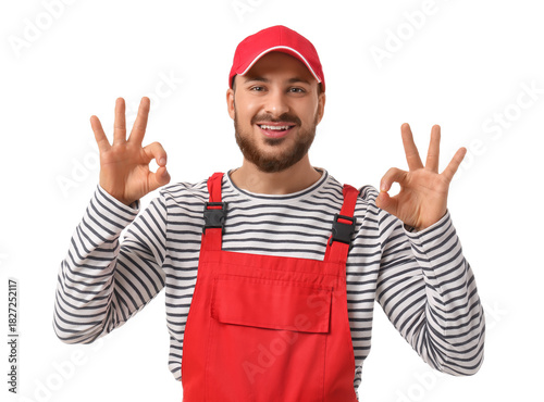 Male worker showing OK on w...