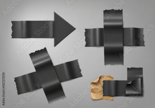 Black adhesive tape shapes including arrow and crosses on a neutral background