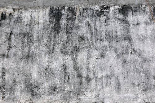 Old weathered cement wall with crack