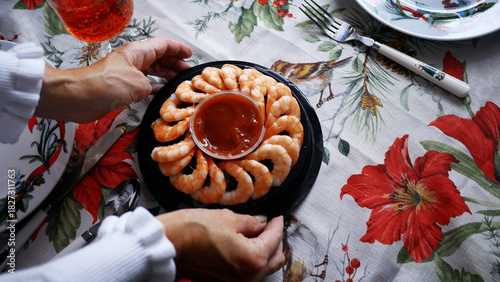  Holiday Feast Series - Woman Places Shrimp and Cocktail Sauce on Table