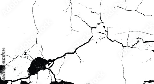 Cracks on the concrete wall. Broken and grated urban street wall construction