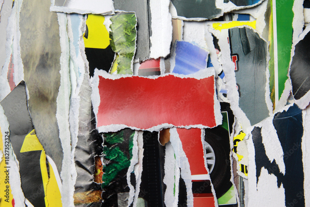 Fototapeta premium Multicolored poster paper, torn into numerous pieces.