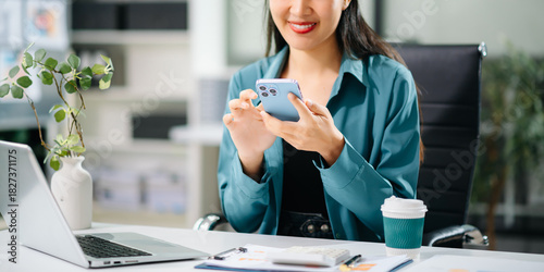Woman hand using smart phone, tablet payments and holding credit card online shopping, omni channel, digital tablet docking keyboard computer at office