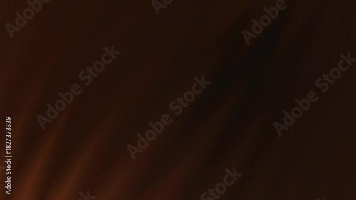 Deep brown hues dominate this abstract background. The texture resembles rippling fabric with soft light catching the subtle folds, creating a sense of depth and movement. 