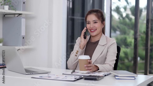 Asian Adult Businesswoman Making Phone Call Working Office Desk Professional Communication Productivity