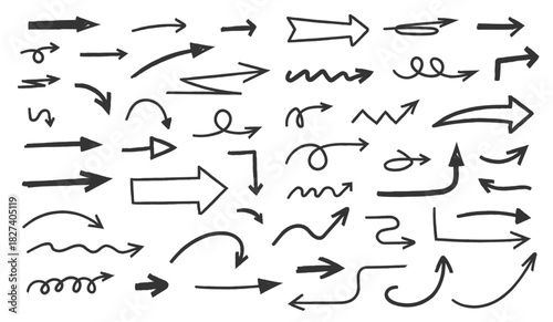 Collection of various hand drawn chalk sketched arrows featuring different shapes, curves, swirls, zigzags, and directions
