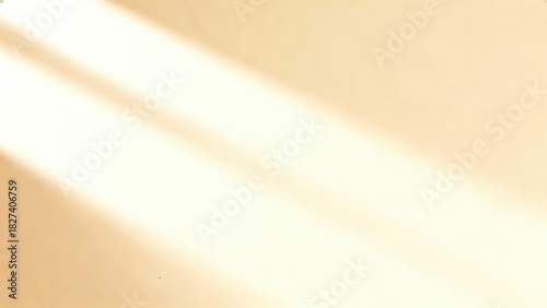 Soft light beams on a warm beige background.