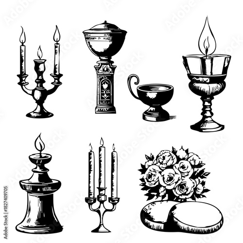 A set of six candles and candle holders. The candles are lit and the holders are made of metal