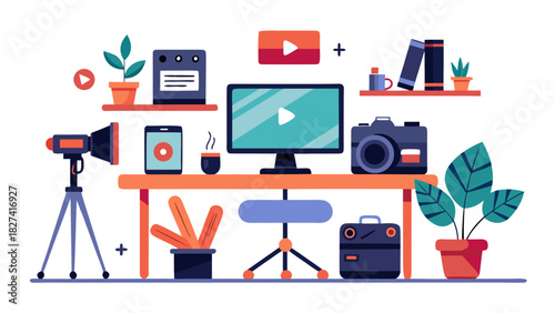 Flat lay video production setup with camera, tripod, monitor, and creative tools on wooden desk