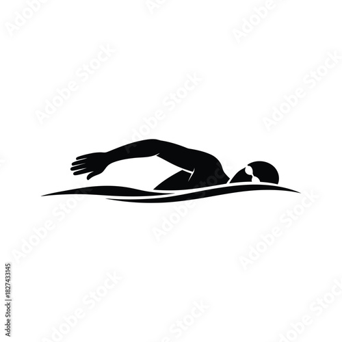 Silhouette of a swimmer performing the freestyle stroke