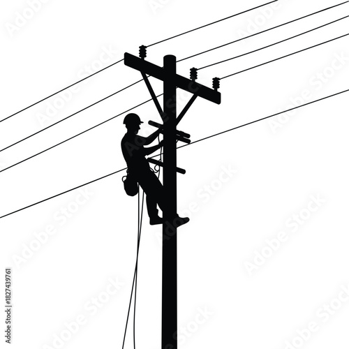 Silhouette of lineman working on utility pole with power lines electricity