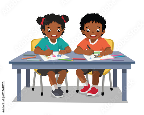 Two African kids students drawing coloring at the table together
