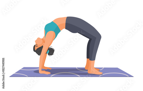 Woman practicing yoga doing wheel pose on the mat
