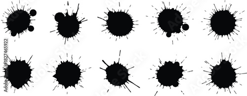 Set of black ink splatters and blobs isolated on white