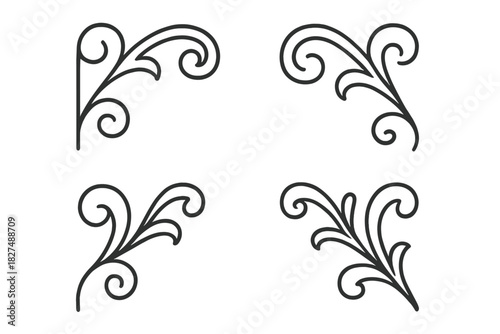 Elegant set of four vintage ornamental corner flourishes featuring swirling floral motifs