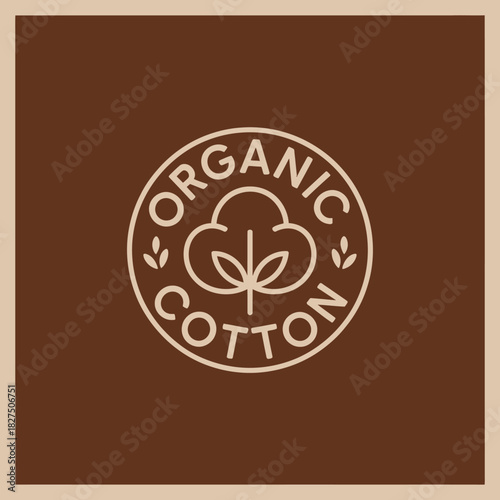 This minimalist illustration features an organic cotton label, highlighting the importance of eco-friendly materials and sustainability in modern fashion and textiles.